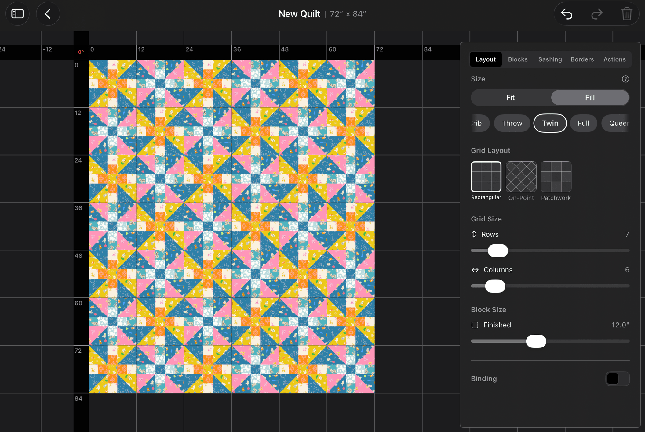 Quilt editor working on a twin-sized quilt